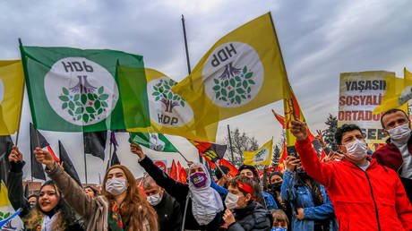 Pro-Kurdish Peoples' Democratic Party (HDP) supporters shout slogans and hold flags during a rally as part of Nowruz (Newroz). \u00a9 Tunahan Turhan/SOPA Images/LightRocket via Getty Images