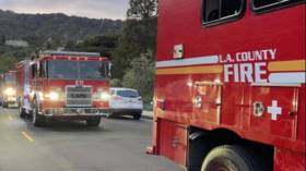 Los Angeles firefighter kills colleague & wounds another before BURNING own home and committing suicide