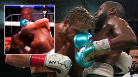 Hold on a minute: Fans convinced Mayweather KNOCKED OUT Logan Paul but propped him up to keep fight going in labored boxing farce