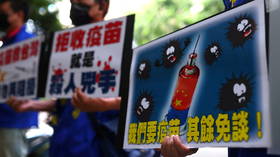 China urges Taiwanese to get Covid-19 shots on mainland as island struggles with coronavirus spike