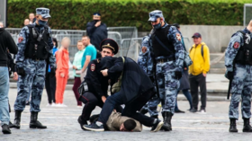 Russian activist arrested on Moscow’s Red Square after firing pistol in air multiple times & faking suicide gunshot to his head