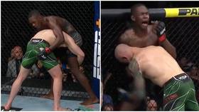 A real a**-whooping: Fans in hysterics as UFC star Adesanya grabs Vettori’s backside, feigns injury in victory at UFC 263 (VIDEO)