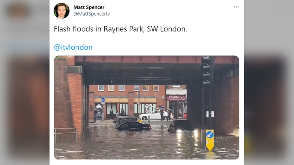 Torrential downpour FLOODS London as water gushes into Tube stations ...