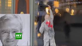 Activists spray BLACK PAINT over LVMH’s posh Paris store to protest inequality during pandemic (VIDEO)