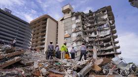 Florida state to demolish rest of collapsed building ahead of approaching tropical storm, as death toll reaches 24