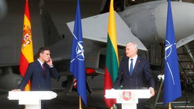 Spanish prime minister forced to break off news conference in Lithuania to let jet take off for urgent mission