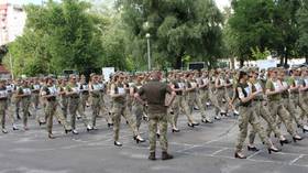 Ukraine developing new shoes for female military personnel after scandal over images of soldiers practicing marches in high heels