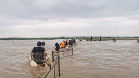Evacuation underway in China’s Inner Mongolia after torrential rain causes two dams to collapse