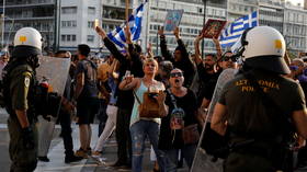 Greek police blast anti-vaccine protesters with water cannon and tear gas outside parliament in Athens (VIDEOS)