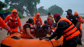 Monsoon rains trigger floods and landslides in India leaving at least 67 dead