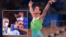 ‘A true fighter’: Russian fencer leaves medal ceremony in WHEELCHAIR after defying injury to help team win Tokyo gold (VIDEO)