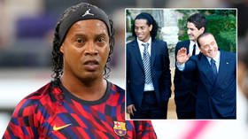 Football ace Ronaldinho admits ex-prime minister Silvio Berlusconi is ‘in my heart’, brandishes huge bottle of wine on Italy jolly