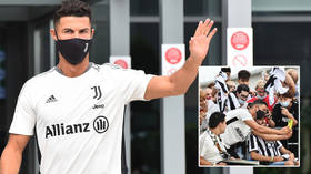 Ron-dezvous: Cristiano Ronaldo mobbed by fans on Juventus return for medical checks after landing by private jet in Turin (PHOTOS)