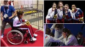 ‘A true fighter’: Russian fencer leaves medal ceremony in WHEELCHAIR after defying injury to help team win Tokyo gold (VIDEO)