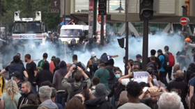 Water cannon v burning barricades: Paris protests against Covid ID turn violent as France resists measure