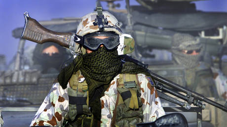 FILE PHOTO. Australian SAS Soldiers on Patrol near Bagram Afghanistan.© Getty Images / Simon O'Dwyer