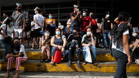 Mayhem in Manila as thousands scramble to get jabbed at Covid vaccine centers while lockdown looms