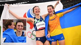 Keeping his distance: Wary Ukrainian Paralympian SNUBS Russian rivals on podium following military backlash against high jumper