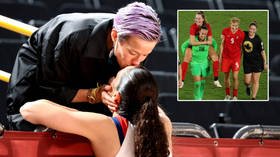 Football star Rapinoe congratulates 1st transgender Olympic champ – and kisses basketball great girlfriend Bird after she wins too
