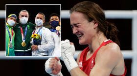 Irish boxing gold medalist Harrington hailed for ‘true Olympic spirit’ as she invites rivals onto podium during medal ceremony