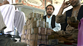 Afghan currency crashes amid turmoil as central bank chief flees Kabul