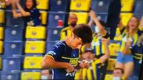 Fenerbahce star goes viral for trying and failing to kiss badge on ridiculed new Puma shirt (VIDEO)