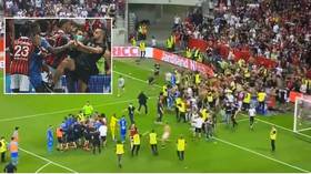 ‘They don’t look so Nice’: CHAOS in France as Nice-Marseille match abandoned after fans invade pitch in clash with players (VIDEO)