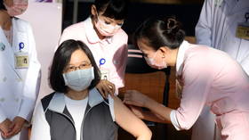 Taiwan’s president gets first shot of homemade Covid-19 vaccine amid concerns over its rushed approval
