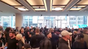 WATCH: Crowd protesting against Covid restrictions breaches ITN building