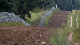 Polish military finishes first 6km of barbed wire wall on Belarusian border, minister says, to halt migrant influx