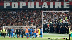 ‘I must be punished’: Fan who made Nazi salute in French football riot admits he is ‘ashamed’ after handing himself in to police