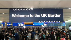 CHAOS at London’s Heathrow Airport as passengers forced to wait for 5 hours in packed queues despite Covid-19 risk (PHOTOS)