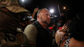 Alex Jones files lawsuit against FAA over drone restriction at border crossing where thousands of migrants are gathering