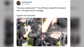 ‘Are you undercover?’ WATCH riot cops at Justice for J6 rally detain masked man with a GUN… and a badge