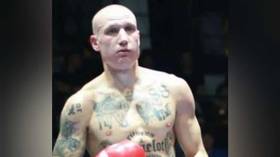 Italian boxer with Nazi & white supremacist tattoos causes outrage after fight is livestreamed by major sports outlet