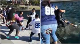 Brawling NFL fans end up in lake as wild punch-ups break out between Cowboys & Chargers fans (VIDEO)