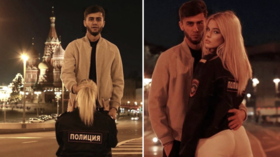 ‘Happy slapping’ Tajik blogger says sorry after raunchy snaps with blonde ‘police woman’ outside Moscow cathedral outrage Russians