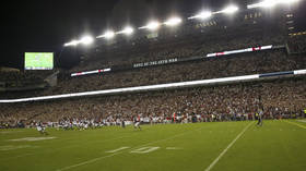 ‘Bottles with brown stuff in’: US college football fans condemned for hurling objects at coach, cheerleaders evacuate (VIDEO)