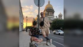 Russian Instagram star released by cops after bare butt photo outside iconic St. Petersburg cathedral landed model in hot water