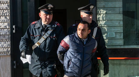 FILE PHOTO: Francesco Sabino (C) arrested by Carabinieri during operation who dismantled an illicit system of hoarding and managing public housing operated with the 'ndrangheta type mafia method. © Alfonso Di Vincenzo / KONTROLAB / LightRocket via Getty Images