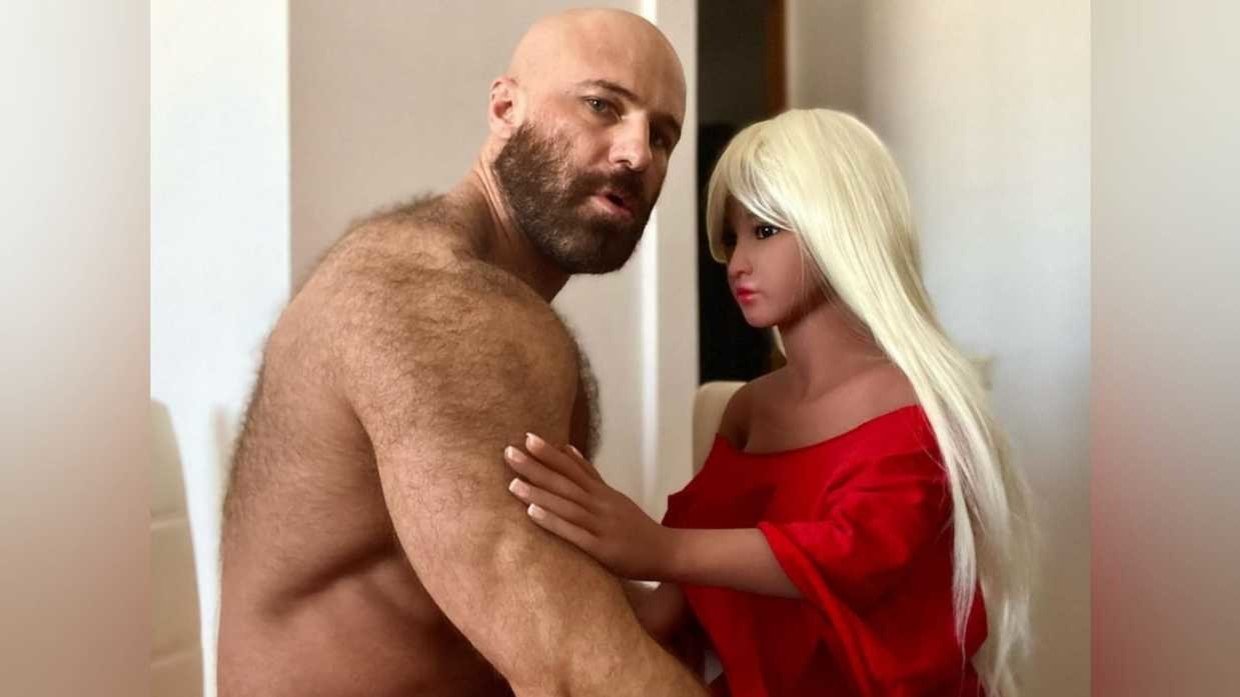 Kazakh bodybuilder takes second sex-doll wife on honeymoon picture