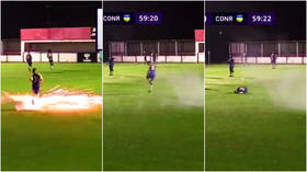 ‘Madness’: Footballer hit by firework as match is abandoned and police are called on night of shame in England and Ireland (VIDEO)