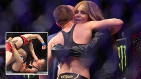 Hollywood superstar Halle Berry places UFC belt around Rose Namajunas after gritty repeat strawweight title win over Zhang Weili