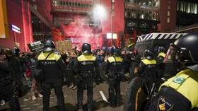 WATCH: Protesters, police clash after new Covid restrictions announced in the Netherlands