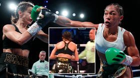 Out on her feet: Female boxer knocked out standing up in shuddering title KO (VIDEO)