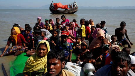 FILE PHOTO: Rohingya refugees are crossing the Bangladesh-Myanmar border on November 9, 2017.