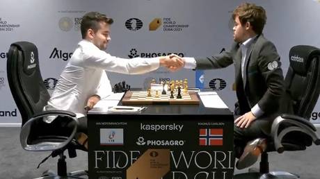 L to R) Bronze medalist Daniil Dubov of Russian , gold medalist Sergey  Karjakin of Russian and silver medalist Magnus Carlsen of Norway pose on  the podium at the medal ceremony for