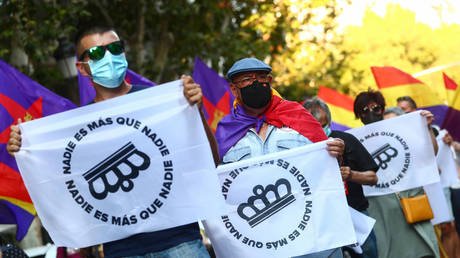 FILE PHOTO. Protesters hold banners during a demonstration against Spanish monarchy amid allegations of corruption against former King Juan Carlos.