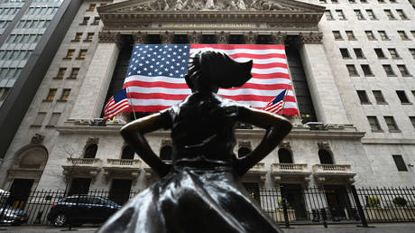 The Fearless Girl statue stands in front of the New York Stock Exchange near Wall Street on March 23, 2020 in New York City.  Angela Weiss / AFP
