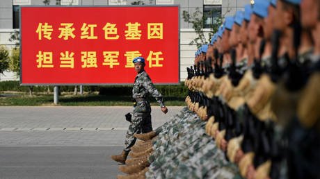 FILE PHOTO: Chinese troops practice marching ahead of a military parade to celebrate the 70th anniversary of the country's founding, on the outskirts of Beijing, China, September 25, 2019 © Reuters / Wang Zhao
